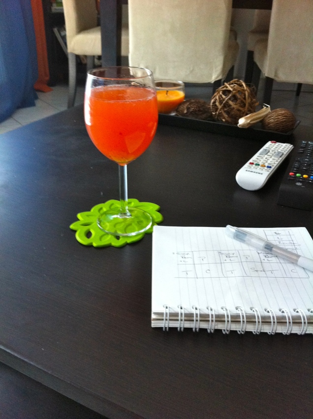 Planning next year's garden while enjoying the taste of summer - a strawberry spritzer: 1/4 glass of syrup, 1/4 glass of white wine, & the rest filled with cold sparkling water. Prost!